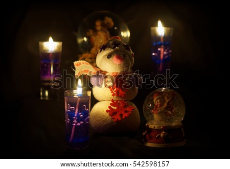 Christmas decoration - handmade toy snowman with candles - isolated