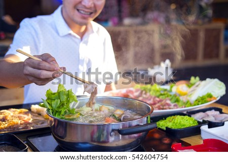 Selective focus Shabu Shabu and Sukiyaki, Japanese food Royalty-Free Stock Photo #542604754