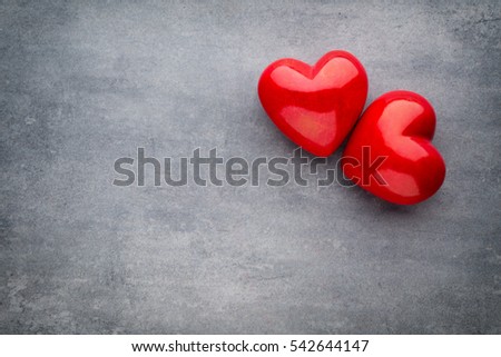 Red heart on the gray background