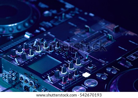 Close up view of professional DJ console Royalty-Free Stock Photo #542670193