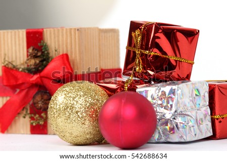 Santa Clause and Christmas gift box on white background