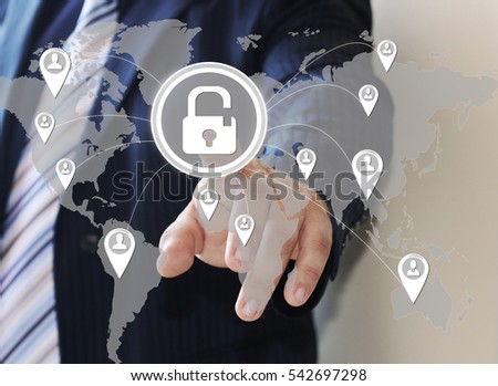 Businessman pushing icon of security shield business from viruses on the Internet on the touch screen. 