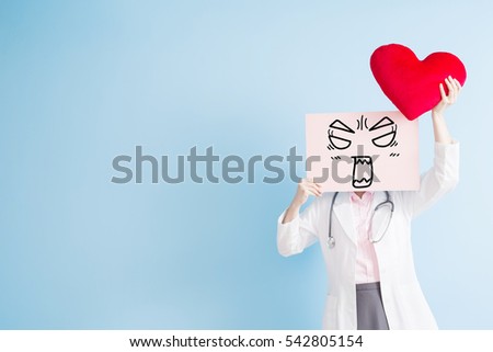 woman doctor take angry billboard and heart isolated on blue backgorund, asian