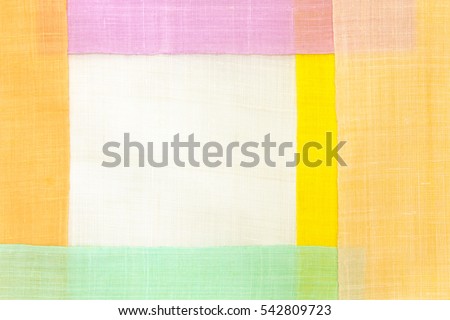 Traditional patchwork background of ramie fabric.
 Royalty-Free Stock Photo #542809723