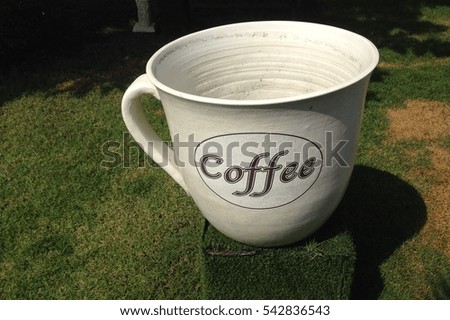 Coffee cup in garden