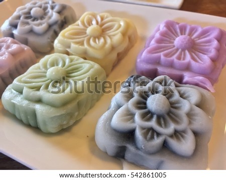 pastel soft moon cake on white plate