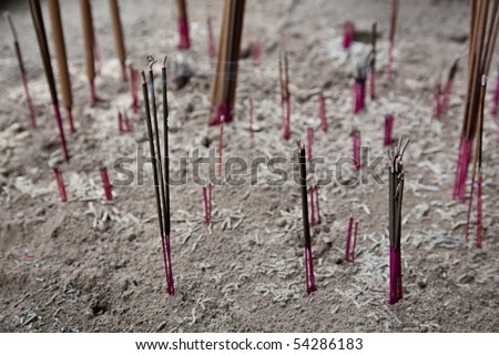 burning incense sticks Royalty-Free Stock Photo #54286183