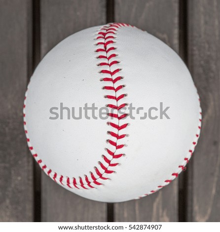Baseball on wooden background