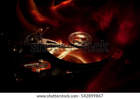 computer hard drive and abstract background fire 