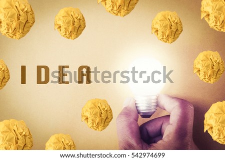 new idea with hand holding light bulb, Business concept