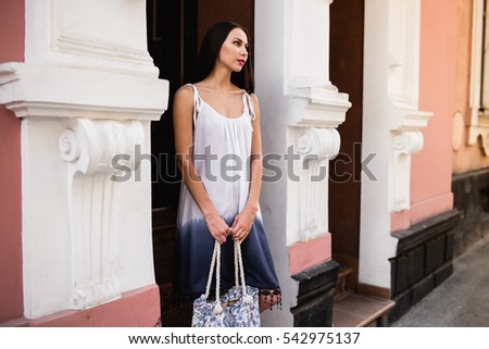 Girl with bag, model in dress, beautiful girl