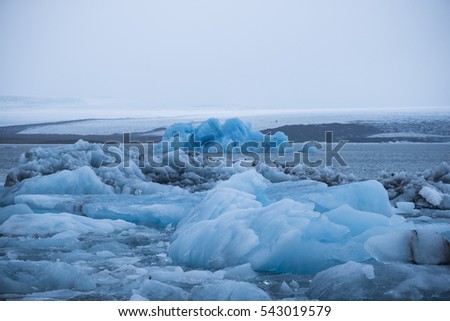 Beautiful glacial lake full of blue icebergs in the south Iceland