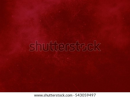 Bright red abstract textured background. Texture of red paint with splashes and scratches. School Background Texture Red Valentine's Day Celebration
