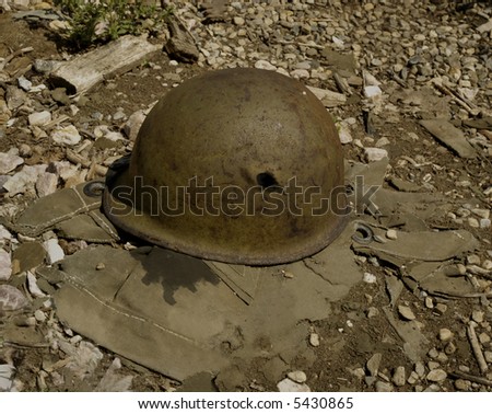 Steel soldiers helmet with bullet hole