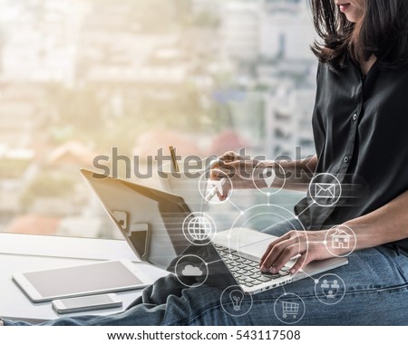 Digital marketing via multichannel communication network icon on mobile smartphone application technology for woman working easy at work or from home on e-commerce online marketplace Royalty-Free Stock Photo #543117508