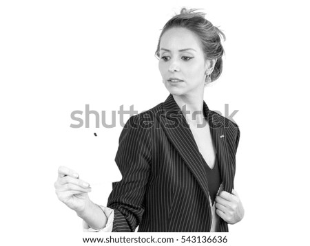 Young woman using tablet pc isolated on the white background on black and white image