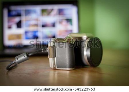 Camera connected to photographer computer / PC; exporting photos (color toned image)