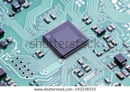 Close up printed circuit board of an electronic device with microelements
 Royalty-Free Stock Photo #543238333