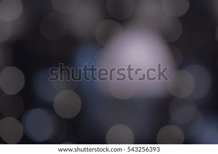 Soft, large, colorful bokeh different colors. Fill the entire background. Tender tones brown,  black, blue, lilac.