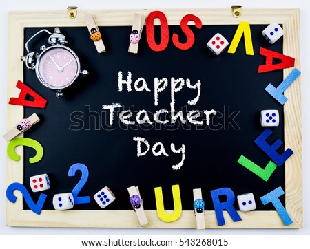 Black writing board with word Happy Teacher's Day
