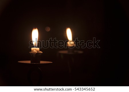 Candle Reflection In Mirror