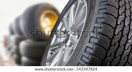 Tires showing for sell or fix in the shop Royalty-Free Stock Photo #543347824