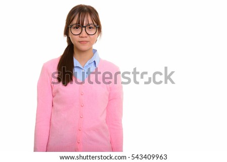 Young cute Asian teenage nerd girl isolated against white background