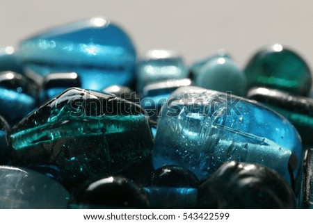 Blue  beads macro on blurred background