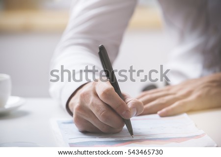 Man signing contract. Close up. Deal concept Royalty-Free Stock Photo #543465730