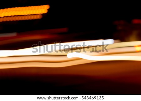 Colorful defocused bokeh lights background. Festive background with natural bokeh. Abstract blur background.
