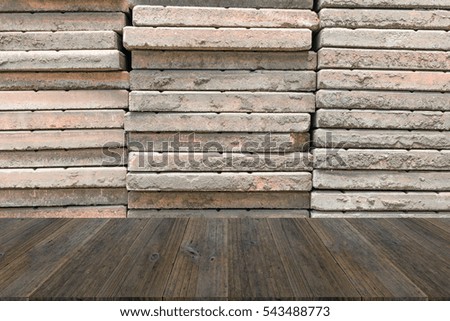 Stone wall texture background surface natural color with wood terrace