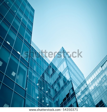 blue glass modern business center at night