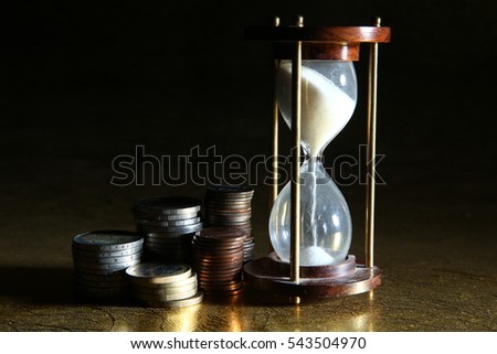 Time is money, Sand-timer Royalty-Free Stock Photo #543504970
