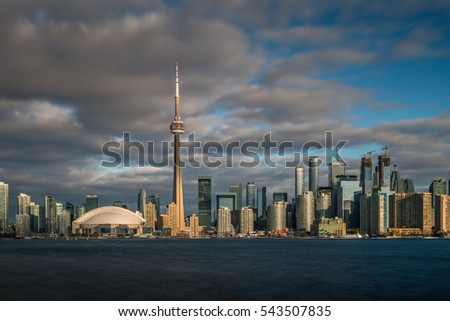 The early morning sunshine casts its glow over the skyline of Toronto, Canada.
