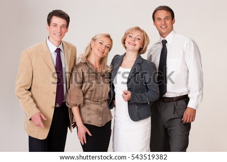 Group of young men and women on isolated background