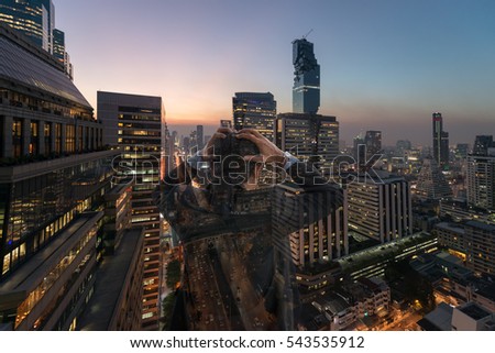 Double exposure Businessman failing and serious  in Business district at Bangkok city background.  Business concept