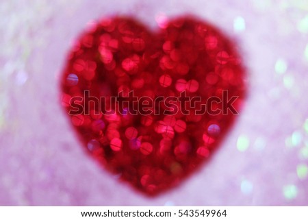 Red heart bokeh glitter as background for Valentines Day
