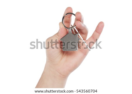 Closeup photo of mans hand holding keys,isolated on white