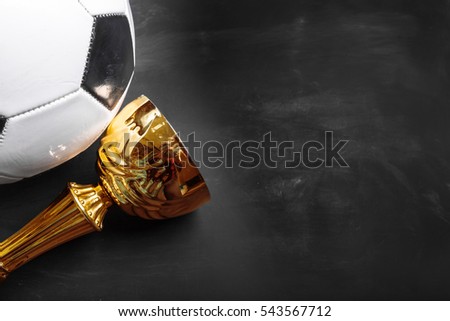 Trophy cup and soccer ball 