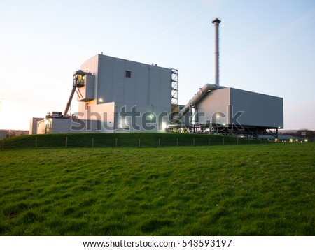 biomass power station at dusk Royalty-Free Stock Photo #543593197