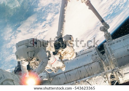 Astronaut in the outer space. "The elements of this image furnished by NASA"