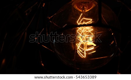 Inside the light bulb.