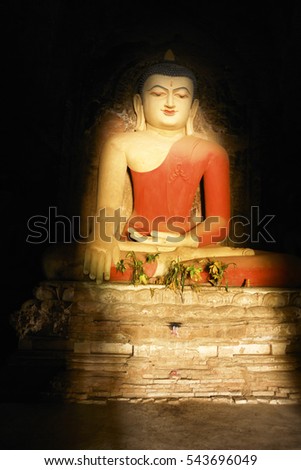 Light on a Buddha statue in Myanmar / Burma