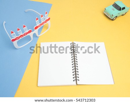 Top view for birthday concept to create idea copy space on color background.Cute object car vintage and glasses composition.