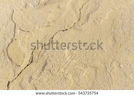 Uneven concrete surface. Crack along the entire length