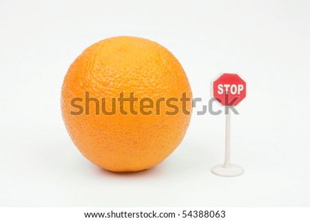 Orange and sign stop on a white background