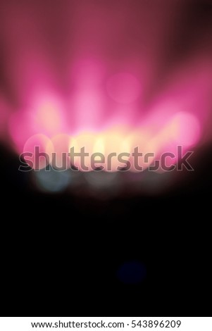 High resolution abstract motion blurred background glowing circle in the dark bright pink and white with blurred luminous rays up, picture of rock concert, music festival, New Year eve celebration