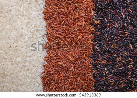 red, black and white rice background or texture Royalty-Free Stock Photo #543913369