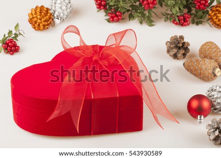 red gift box over white background