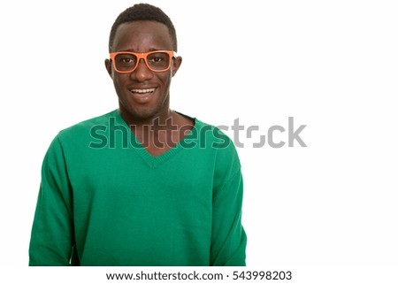 Young happy African man smiling isolated against white background
